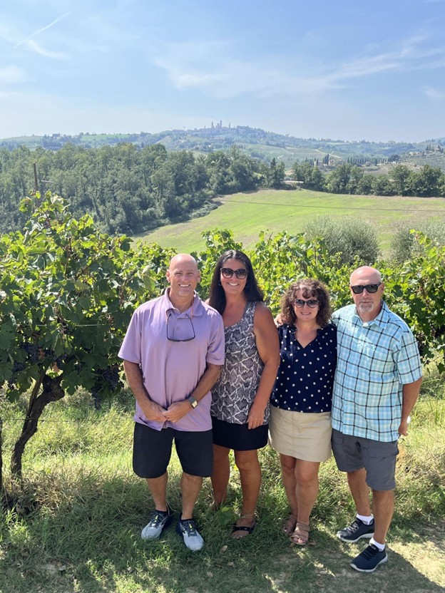 Exploring vineyards in Italy with my husband Joe, and our friends Brandon and Stef.