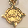 photo of gold Compass pendant