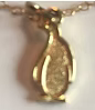 photo of gold penguin pendant